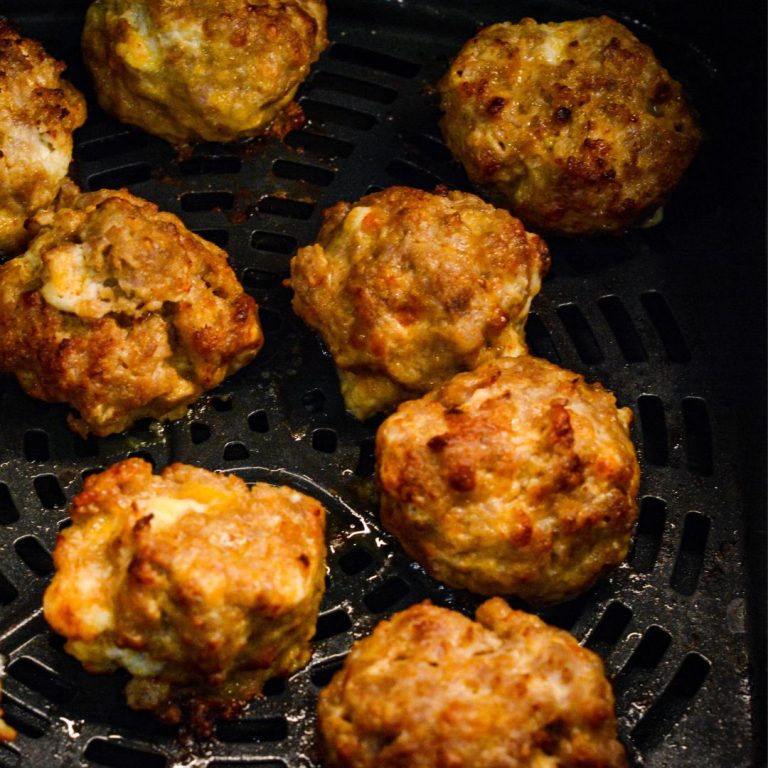 Make these delicious Air Fryer Sausage Balls with ground pork, cream cheese, Colby Jack, Parmesan, and breakfast sausage seasoning for a quick and high protein breakfast.