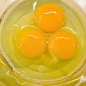 Beat the eggs and add milk in a large bowl.