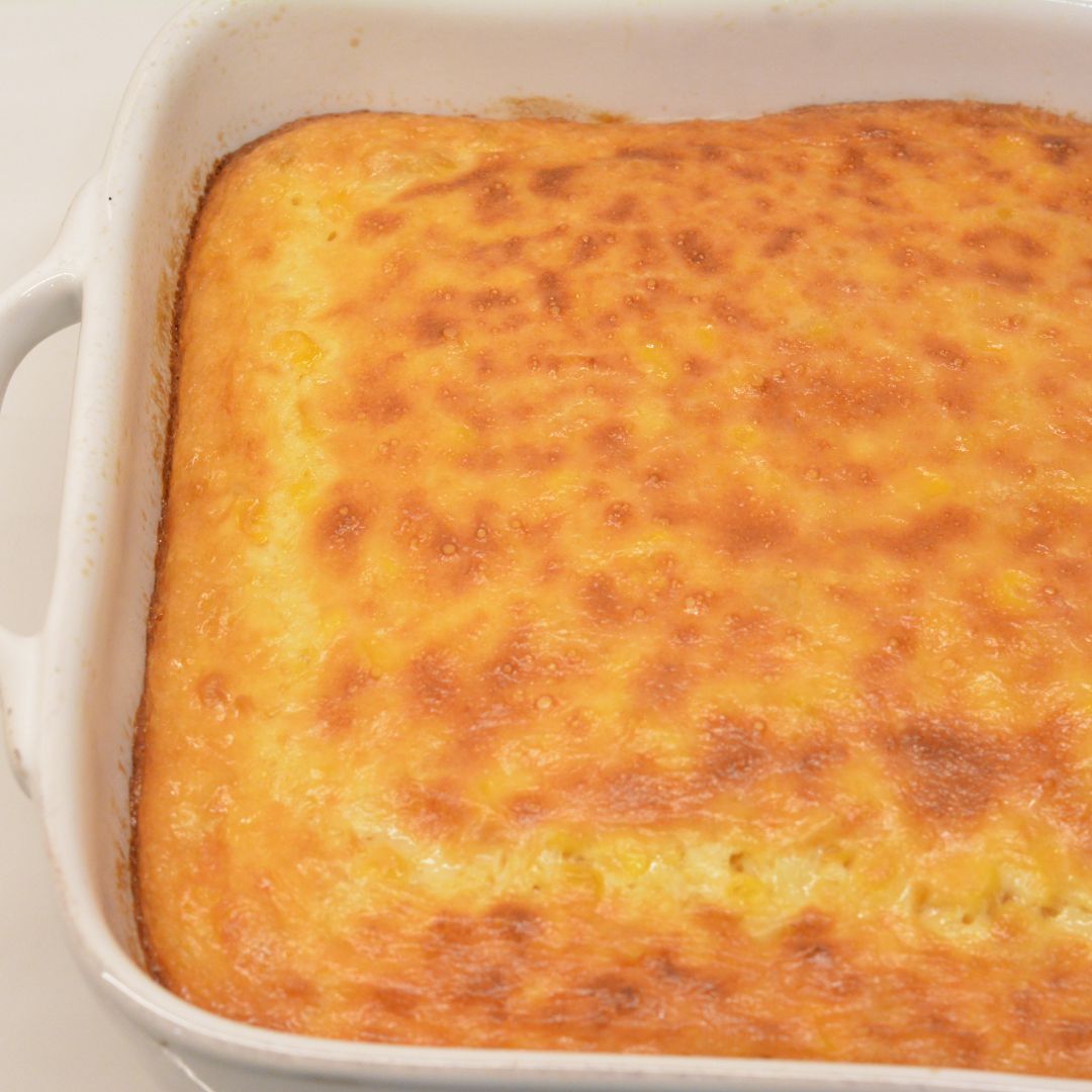 This homemade corn pudding is the ultimate side dish! Made with creamed corn, kernel corn, cornstarch, and evaporated milk, it's creamy, comforting, and easy to make—no box mix required!