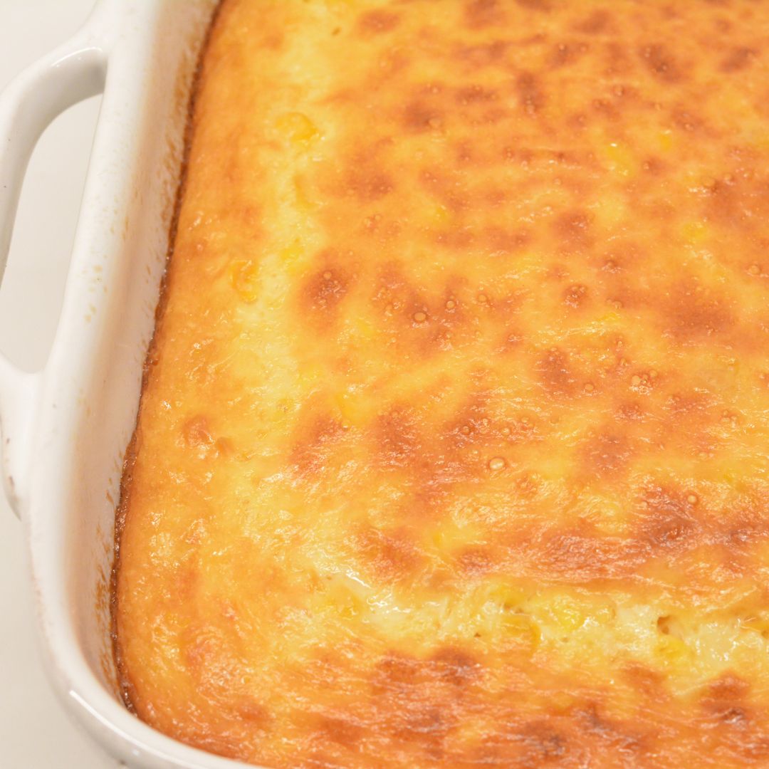 Let the corn casserole pudding cool slightly before serving. Enjoy warm for the best flavor and texture!