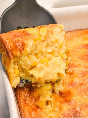 This homemade corn pudding is the ultimate side dish! Made with creamed corn, kernel corn, cornstarch, and evaporated milk, it's creamy, comforting, and easy to make—no box mix required!