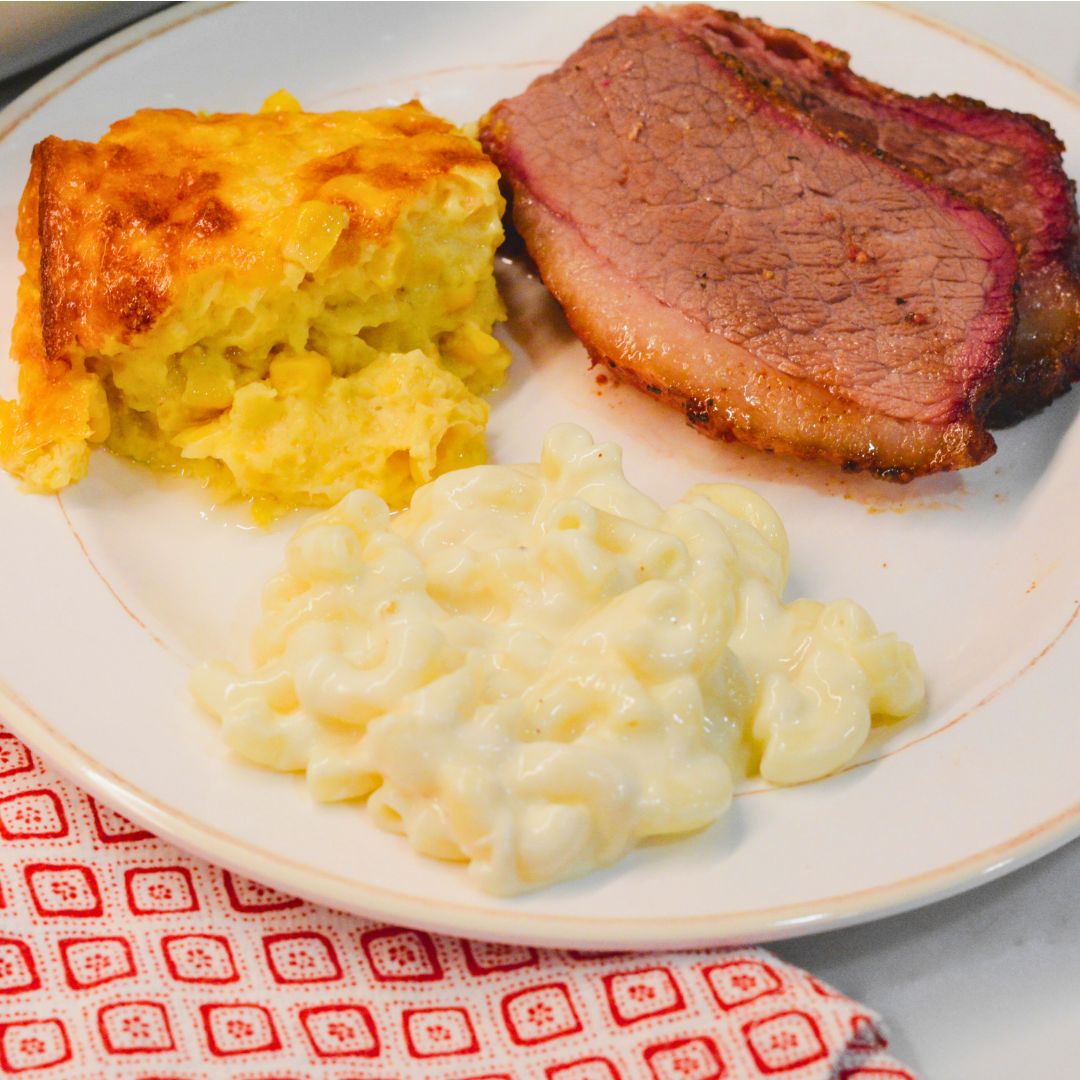 This homemade corn pudding is the ultimate side dish! Made with creamed corn, kernel corn, cornstarch, and evaporated milk, it's creamy, comforting, and easy to make—no box mix required!