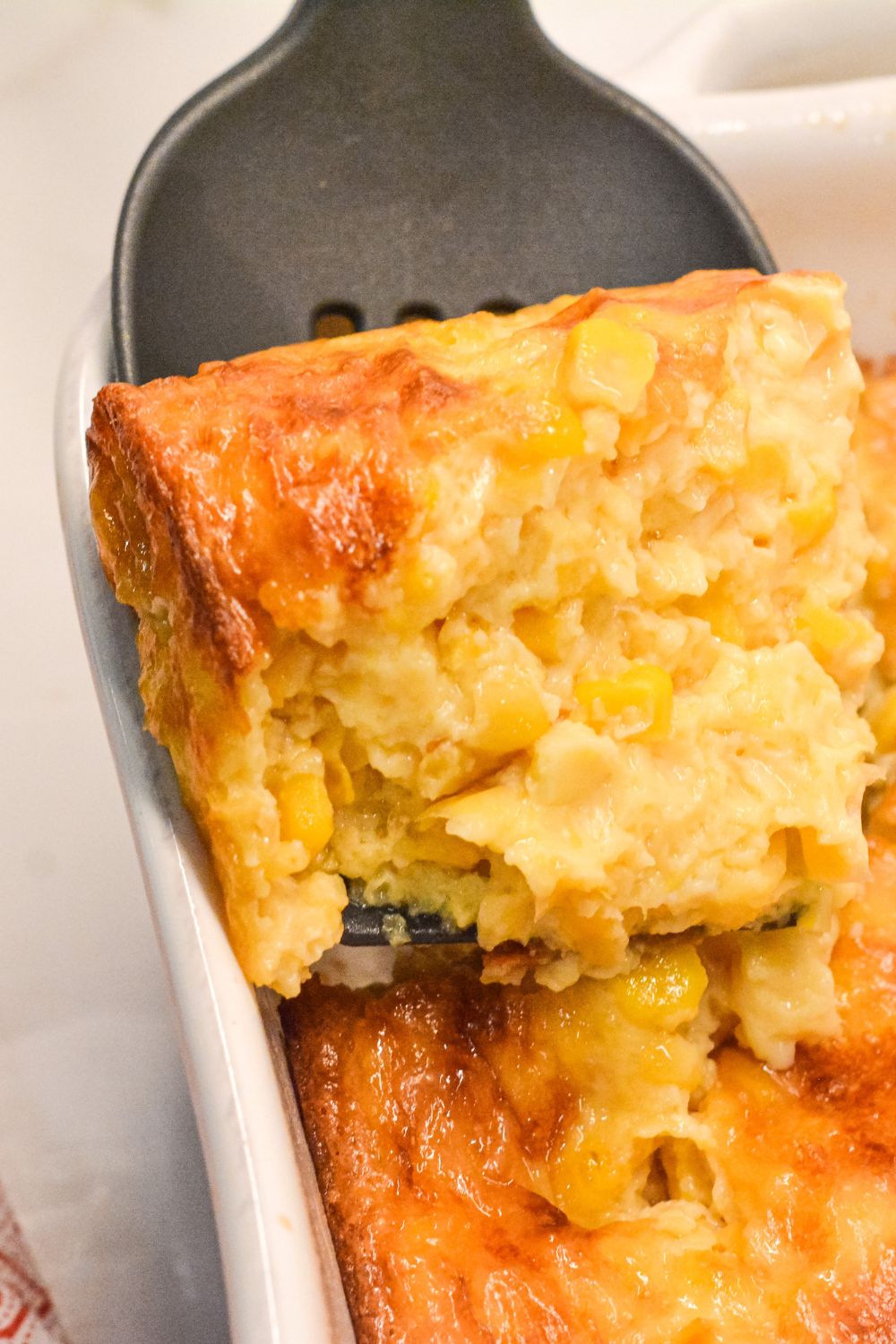 Make this creamy corn pudding with creamed corn, kernel corn, cornstarch, and evaporated milk for a comforting, homemade side dish perfect for holidays or family dinners. Easy to make, rich, and delicious!