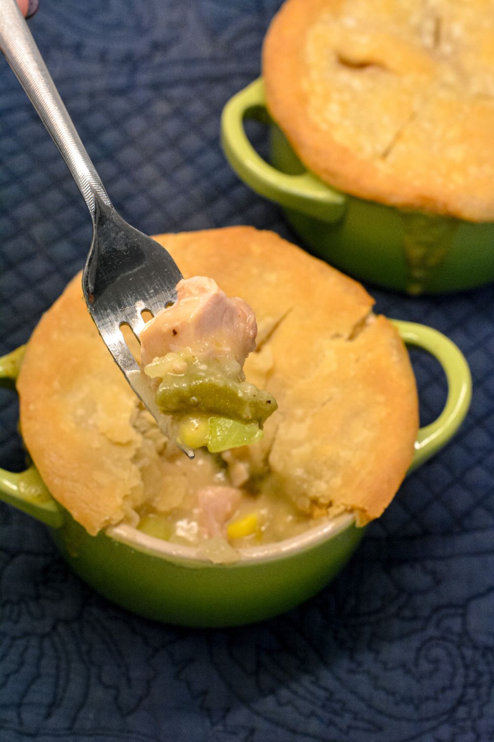 Mini turkey pot pie recipe with leftover turkey, mashed potatoes, corn, and green bean casserole. Quick, easy, and perfect for a comforting meal.