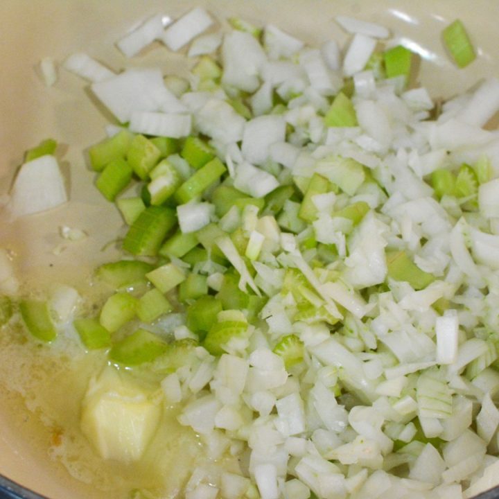 Sauté the aromatics: In a skillet over medium heat, melt the butter. Add the onion and celery, cooking until softened, about 5 minutes.