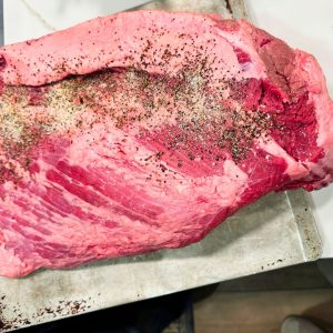 Trimming the Brisket & Seasoning it - Trim excess fat, leaving about ¼ inch. This allows the smoke to penetrate and the fat to render, keeping the meat moist. Generously apply your BBQ rub all over the brisket, ensuring even coverage.