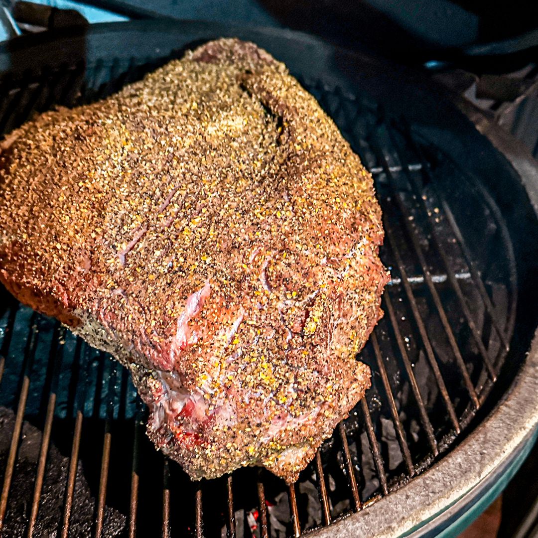 Smoking the Brisket - Place the brisket fat side up on the cooking grate. Close the lid and maintain a steady temperature. Use a water pan if desired for added moisture.