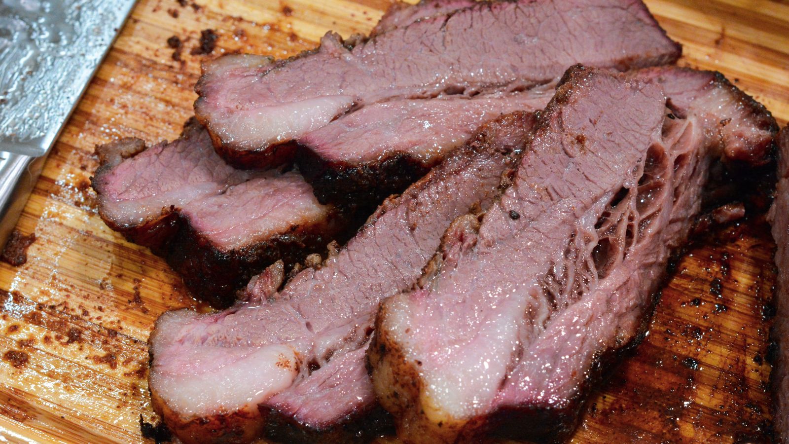 Big Green Egg smoked brisket recipe for beginners and pros. Step-by-step instructions, tips, and a simple rub recipe for smoking brisket on your BGE.