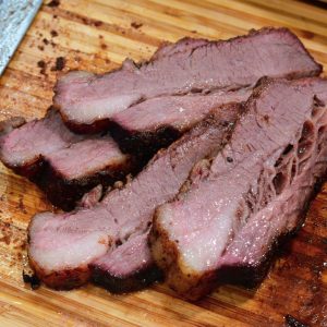 Big Green Egg smoked brisket recipe for beginners and pros. Step-by-step instructions, tips, and a simple rub recipe for smoking brisket on your BGE.