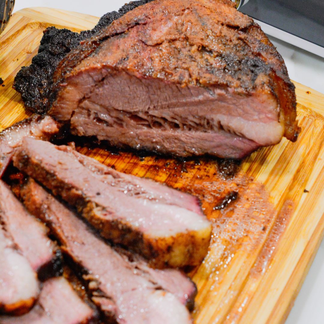 Big Green Egg smoked brisket recipe for beginners and pros. Step-by-step instructions, tips, and a simple rub recipe for smoking brisket on your BGE.