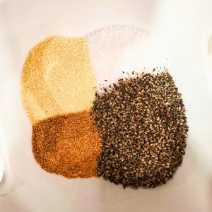 This simple, yet incredibly flavorful rub, featuring just salt, pepper, onion powder, and garlic powder, will have your taste buds singing.