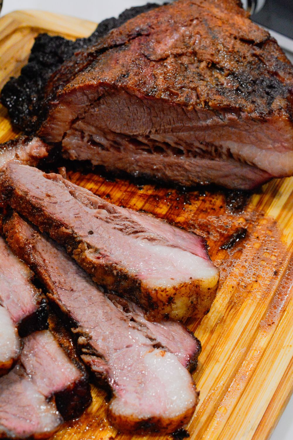 Big Green Egg smoked brisket recipe for beginners and pros. Step-by-step instructions, tips, and a simple rub recipe for smoking brisket on your BGE.