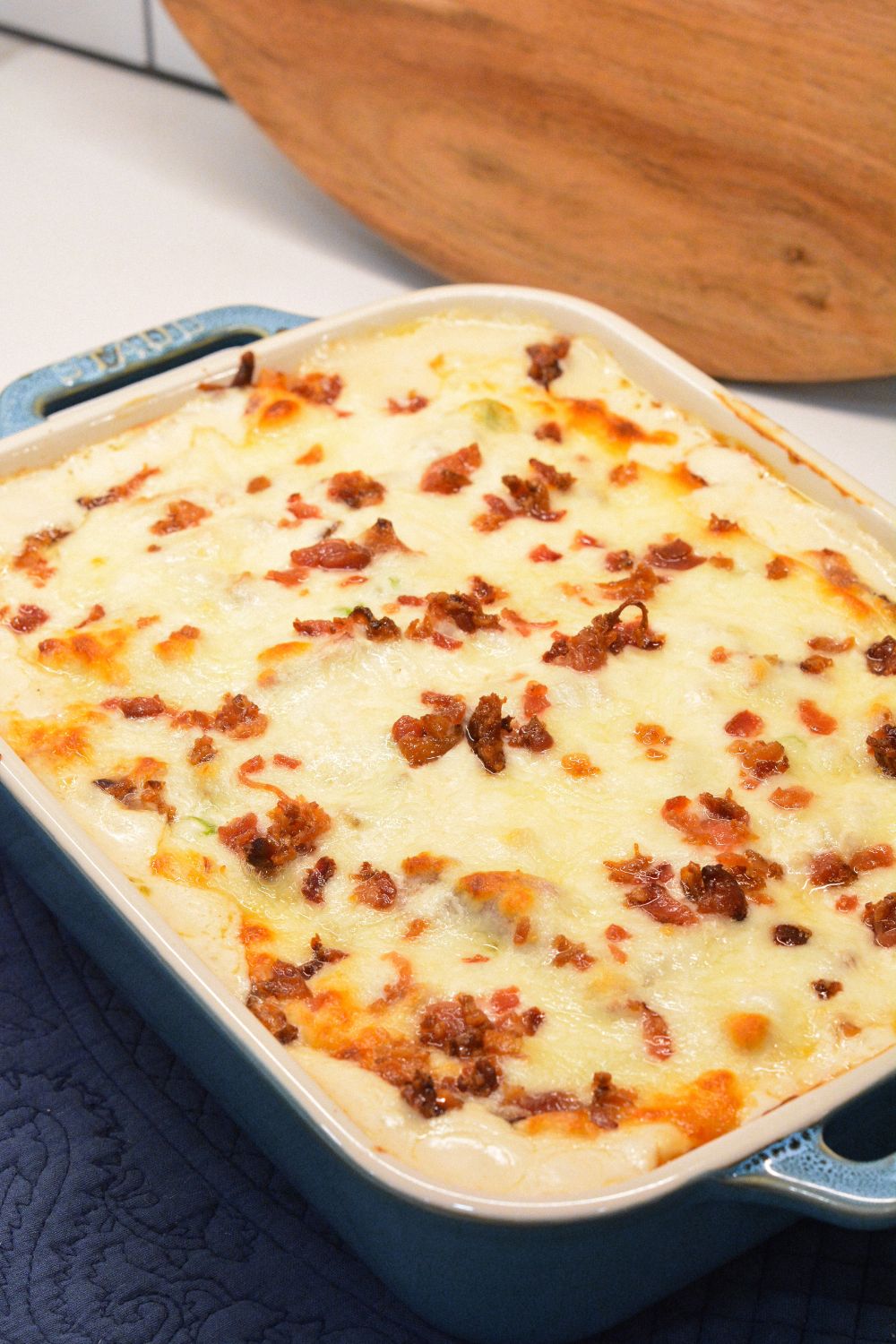 Bake for 25-30 minutes, or until the cheese is melted and bubbly and the ravioli is heated through. Sprinkle with chopped parsley or green onions before serving.