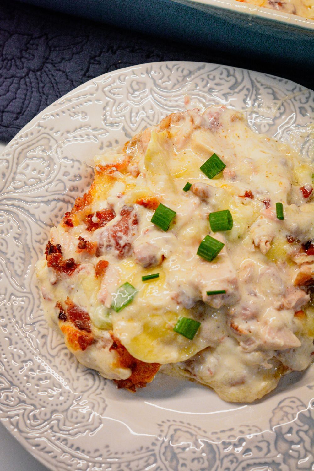 Indulge in creamy, cheesy goodness with this Chicken Bacon Ranch Ravioli Bake. Tender ravioli, savory chicken, crispy bacon, and a rich ranch sauce make this dish irresistible. Easy recipe, perfect for any occasion!