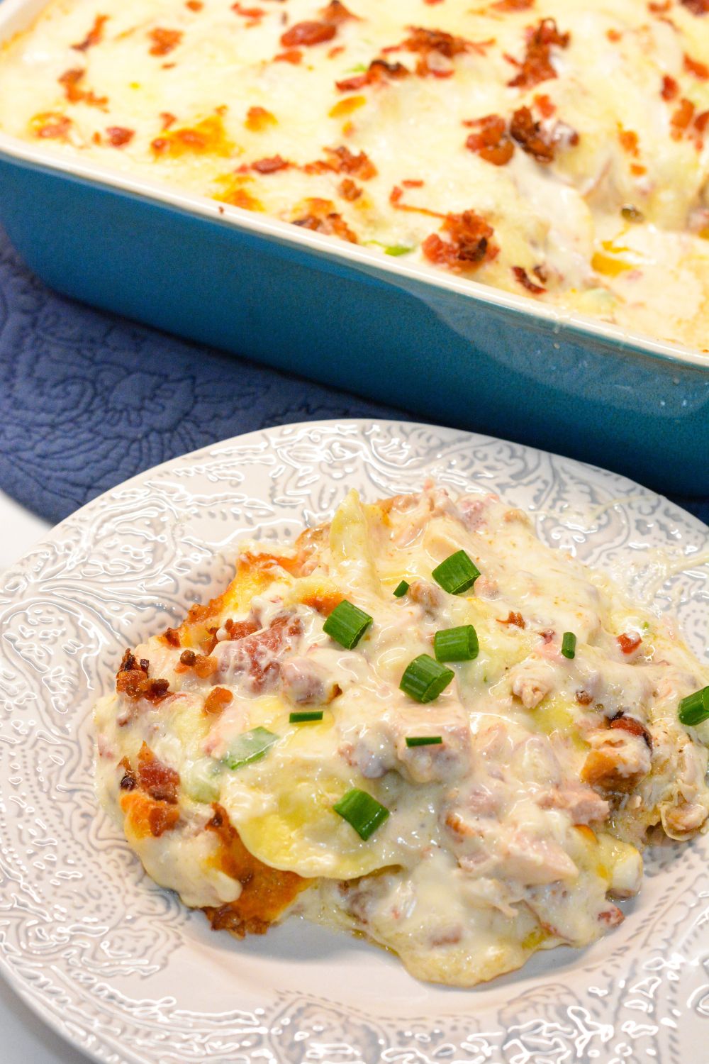 Indulge in creamy, cheesy goodness with this Chicken Bacon Ranch Ravioli Bake. Tender ravioli, savory chicken, crispy bacon, and a rich ranch sauce make this dish irresistible.  Easy recipe, perfect for any occasion!