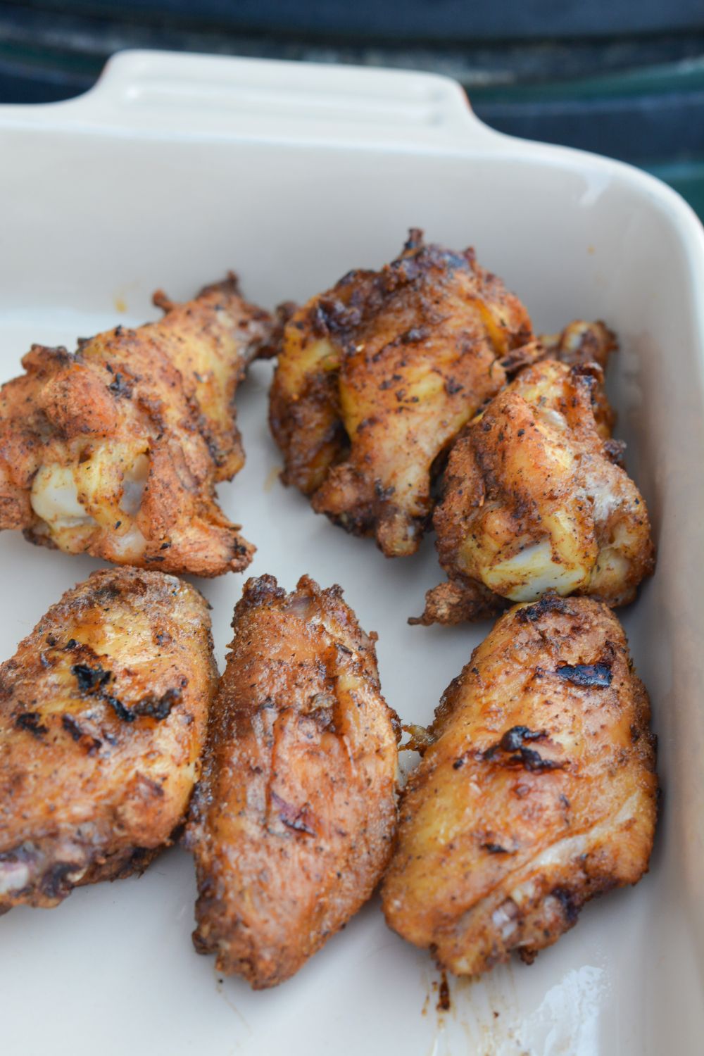 Smoked chicken wings recipe with baking powder for crispy skin. Learn how to make the best dry-rubbed wings in your smoker. Tips, variations, and FAQ included!