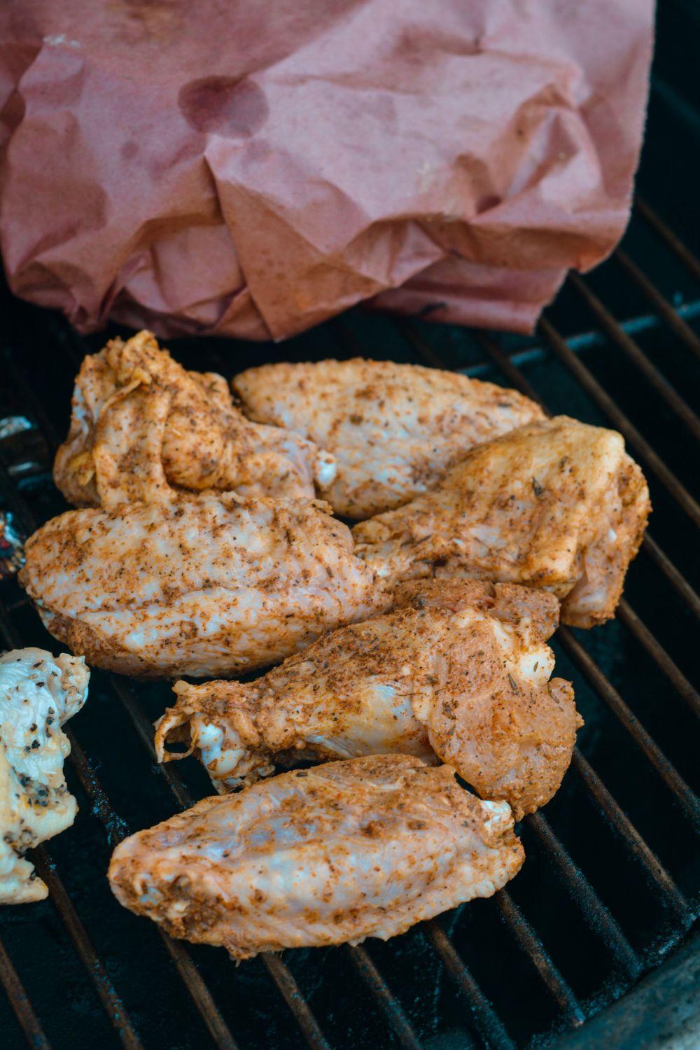 Smoked chicken wings recipe with baking powder for crispy skin. Learn how to make the best dry-rubbed wings in your smoker. 