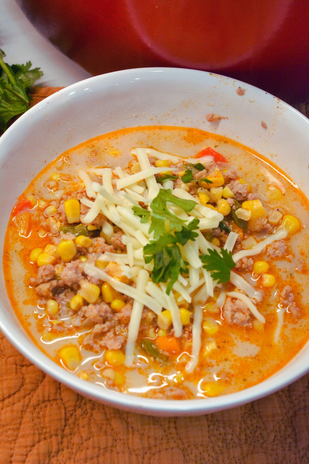 This easy street corn chili with ground pork recipe combines sweet corn, spicy chili, and savory meat. Perfect for weeknight dinners!