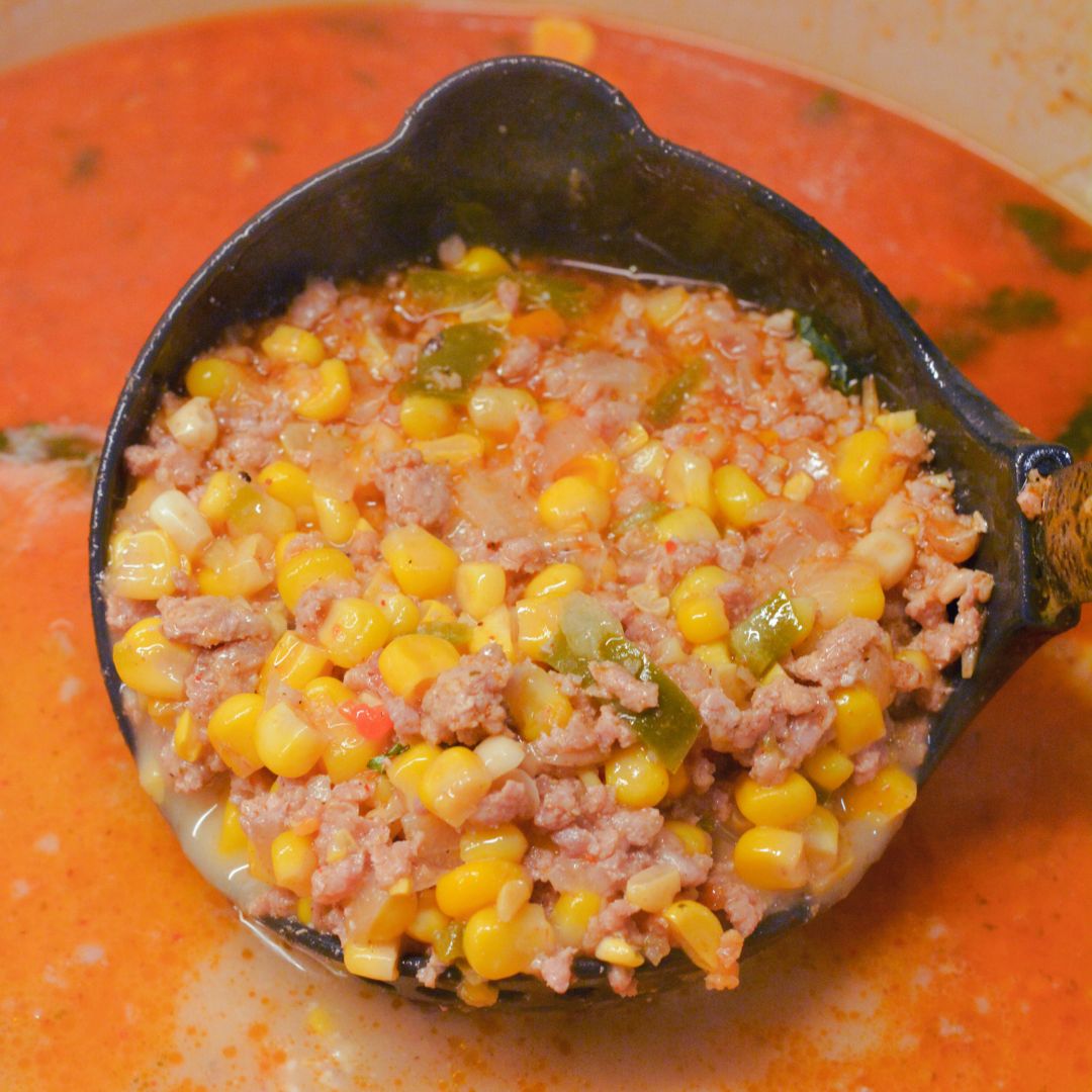 This easy street corn chili with ground pork recipe combines sweet corn, spicy chili, and savory meat. Perfect for weeknight dinners!