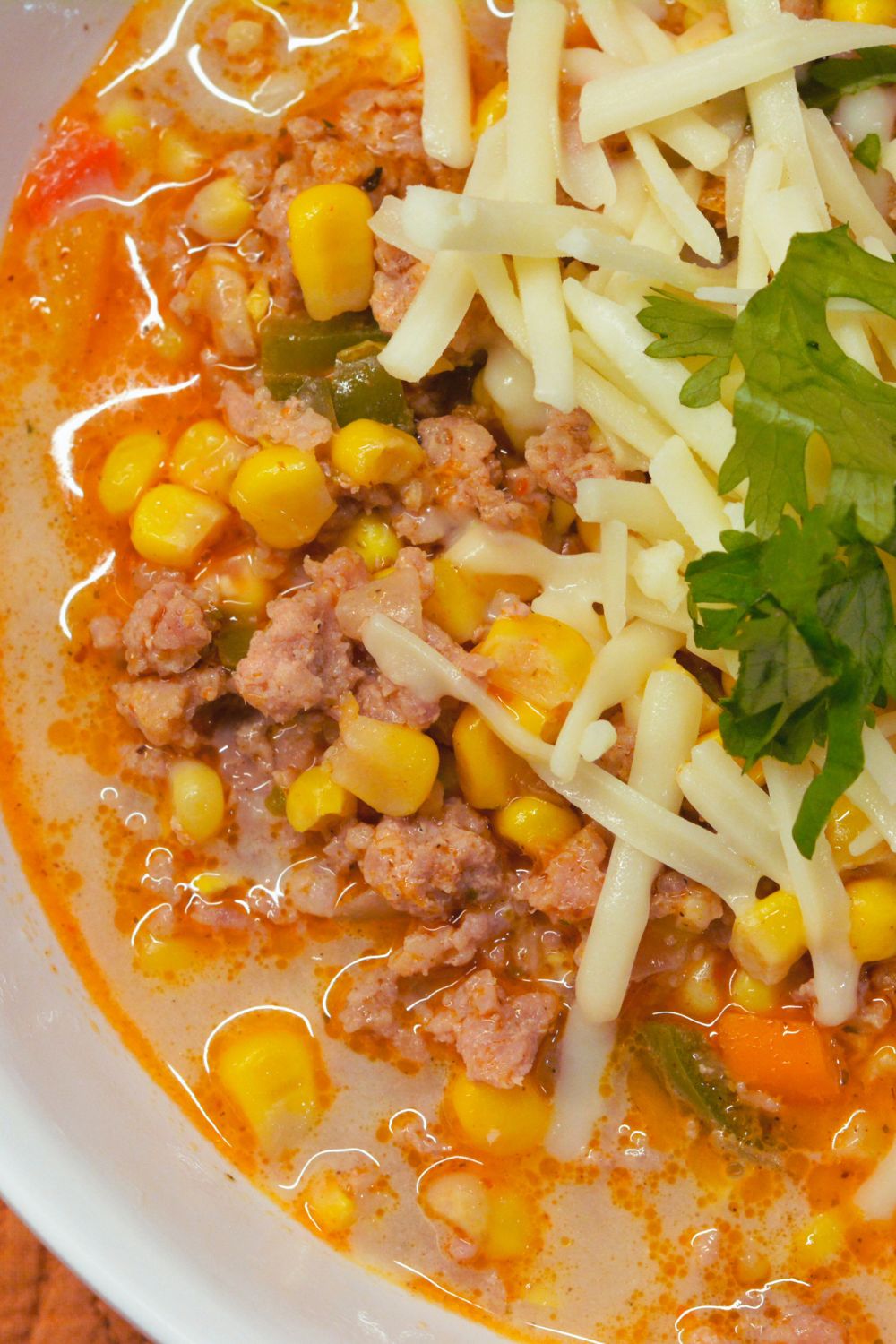 This easy street corn chili with ground pork recipe combines sweet corn, spicy chili, and savory meat. Perfect for weeknight dinners!