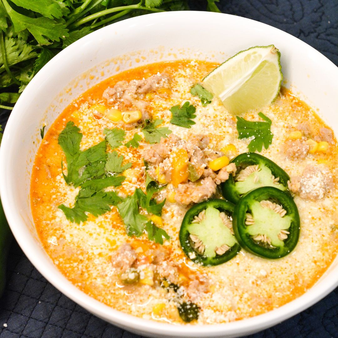 This easy street corn chili with ground pork recipe combines sweet corn, spicy chili, and savory meat. Perfect for weeknight dinners!